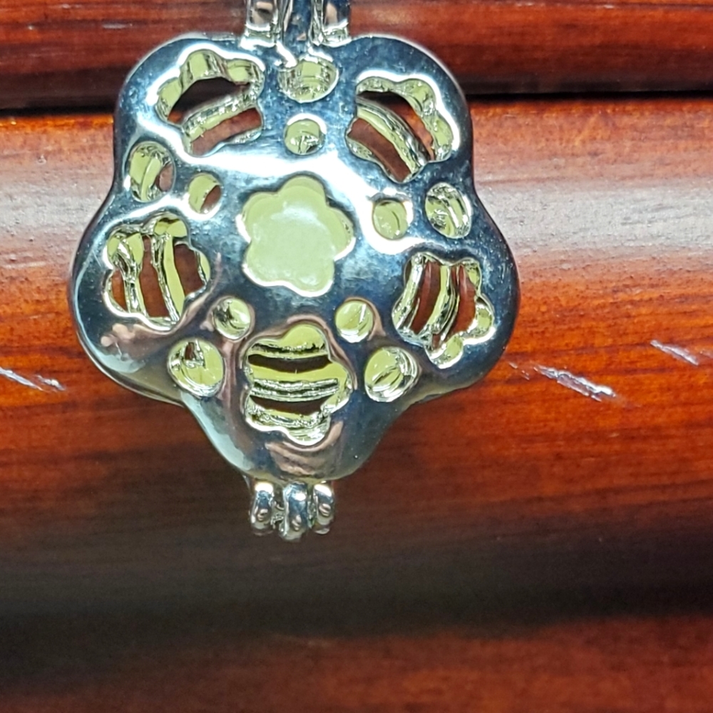 Necklace with glow in the dark pendant